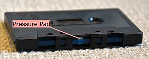 Audio cassette pressure pad